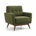 Sillón de tela verde con patas de madera